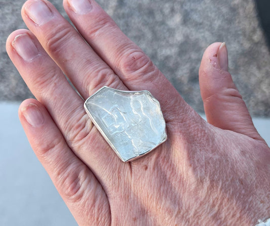 Unveiling the Spiritual Power of Artisan Sterling Silver: A Fusion of Rare Stones and Divine Symbols